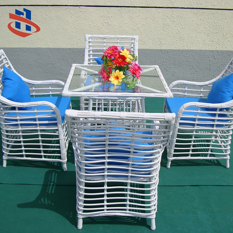 Outdoor rattan furniture dining table set features 2 rattan chairs