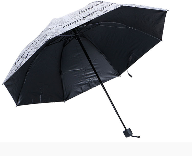 Taobao hot selling creative  umbrella retro newspaper black rubber  triple folding  sunny and rainy umbrella manufacturer