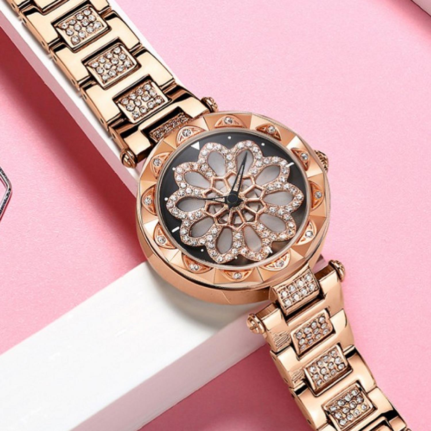 Hot-selling explosive revolving watch feminine tremble with red quartz steel band feminine Watch