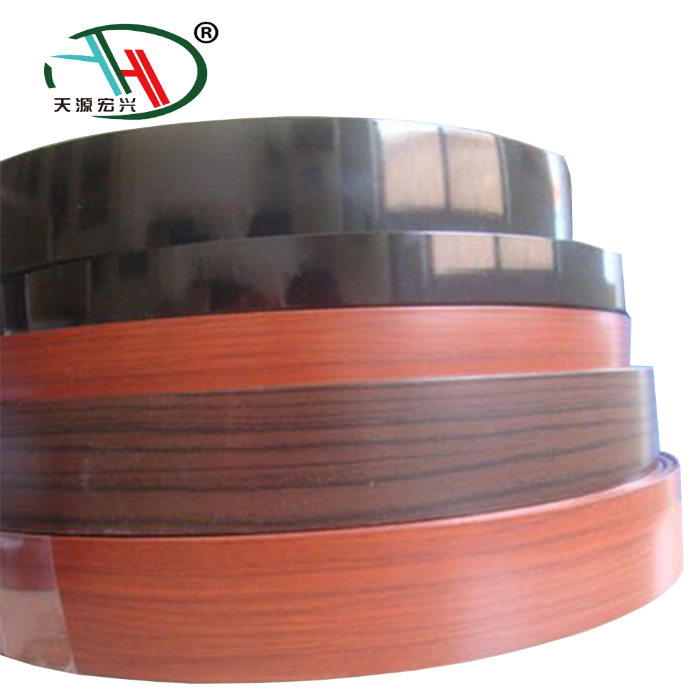 Most popular sell extrusion 0.5*22mm wood grain pvc edge bands tap for furniture
